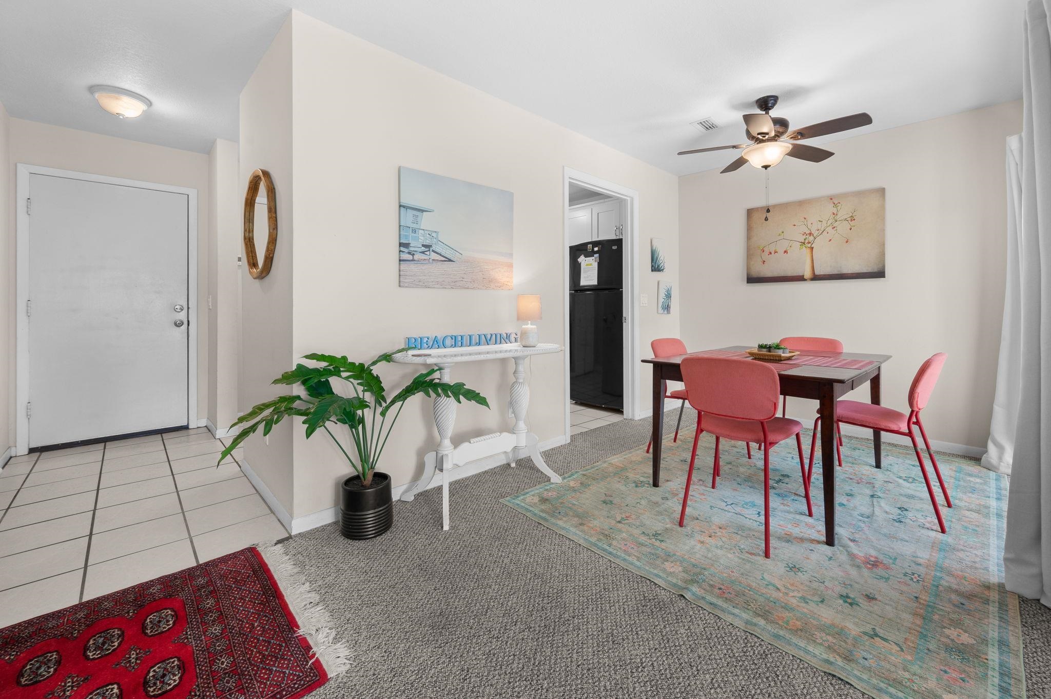 3960 A1A South, Unit 520 St. Augustine, FL 32080 - Photo 8 of 51 a living room with furniture and a potted plant