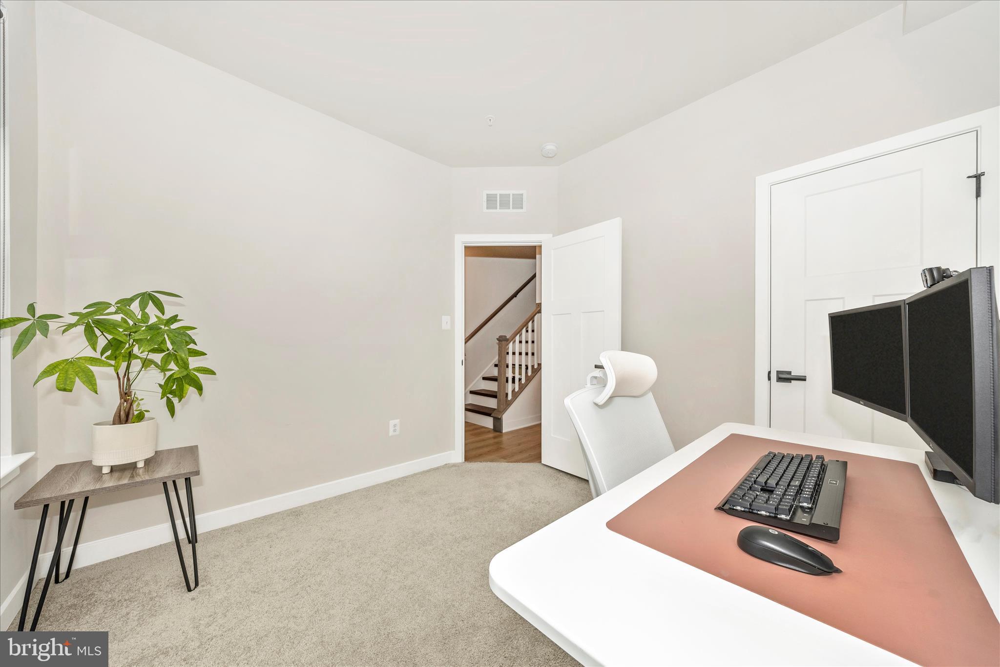 344 Patterson Park Road Frederick, MD 21703 - Photo 22 of 41 a bedroom with a bed and a chair