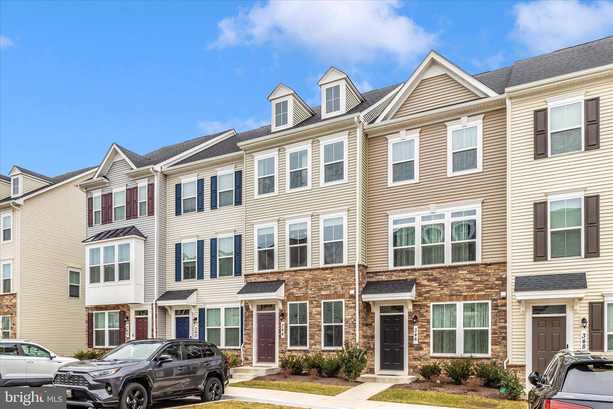 344 Patterson Park Road Frederick, MD 21703 - Photo 30 of 41 a front view of a residential apartment building with a yard