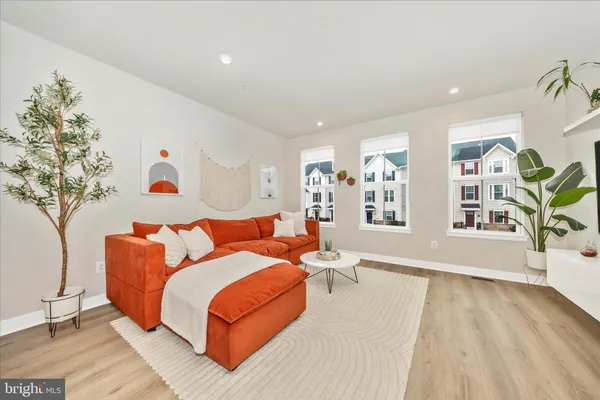 a living room with furniture and window