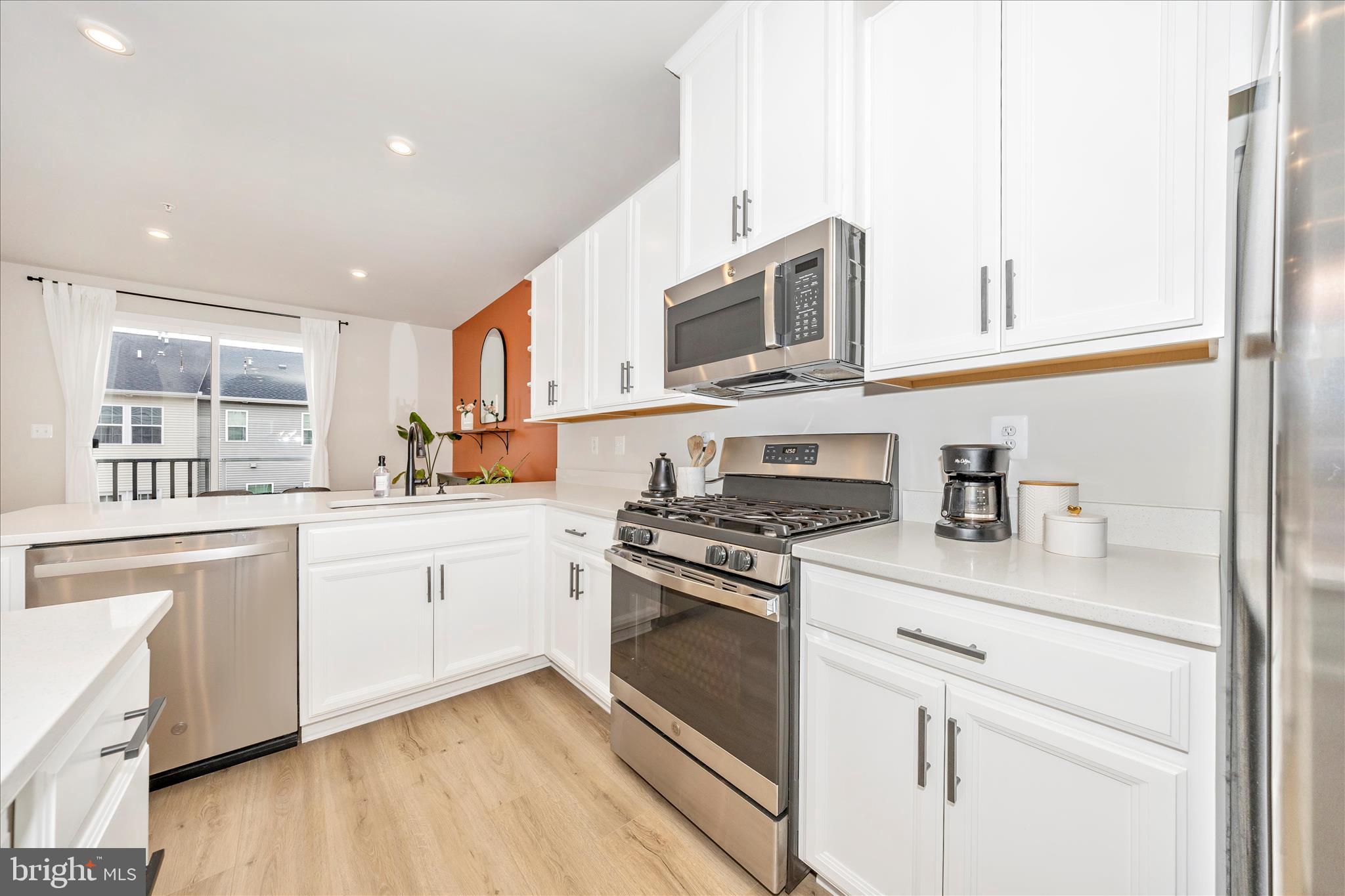 344 Patterson Park Road Frederick, MD 21703 - Photo 7 of 41 a kitchen with stainless steel appliances granite countertop a stove and a sink