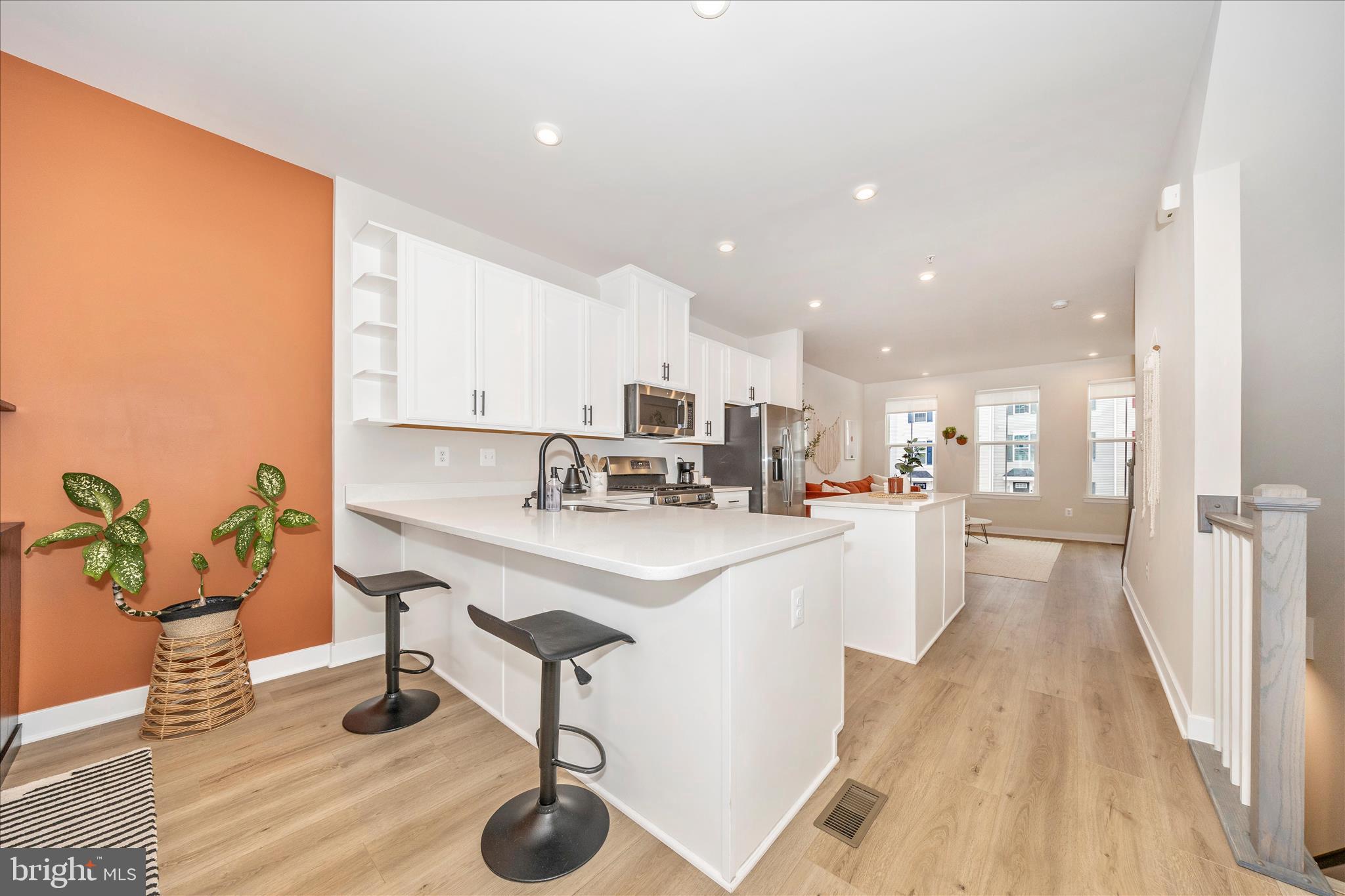 344 Patterson Park Road Frederick, MD 21703 - Photo 9 of 41 a kitchen with stainless steel appliances kitchen island granite countertop a sink and cabinets