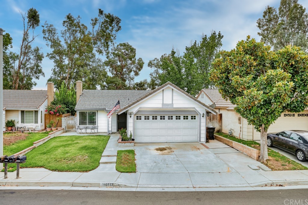 12767 Province Street Rancho Cucamonga, CA 91739 - Photo 1 of 1 a front view of a house with a yard