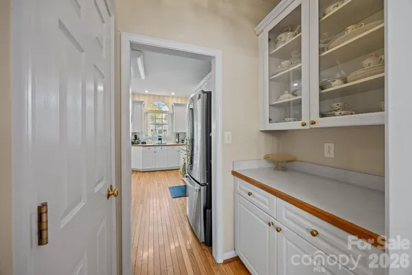 a view of a kitchen from the hallway