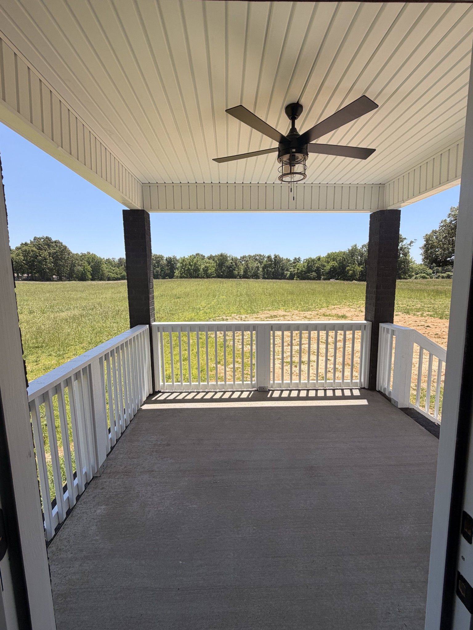527 Old Hopkinsville Road Cadiz, KY 42211 - Photo 14 of 31 a view of a balcony with wooden floor & fence
