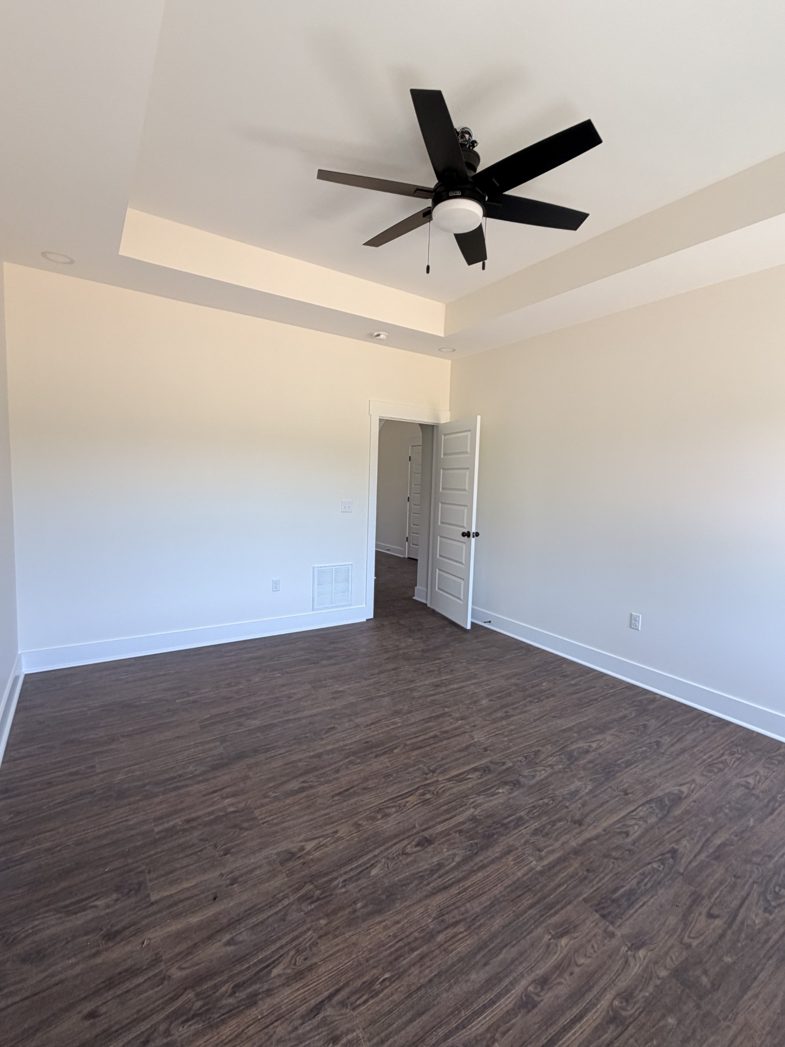 527 Old Hopkinsville Road Cadiz, KY 42211 - Photo 23 of 31 a view of a livingroom with wooden floor and a ceiling fan