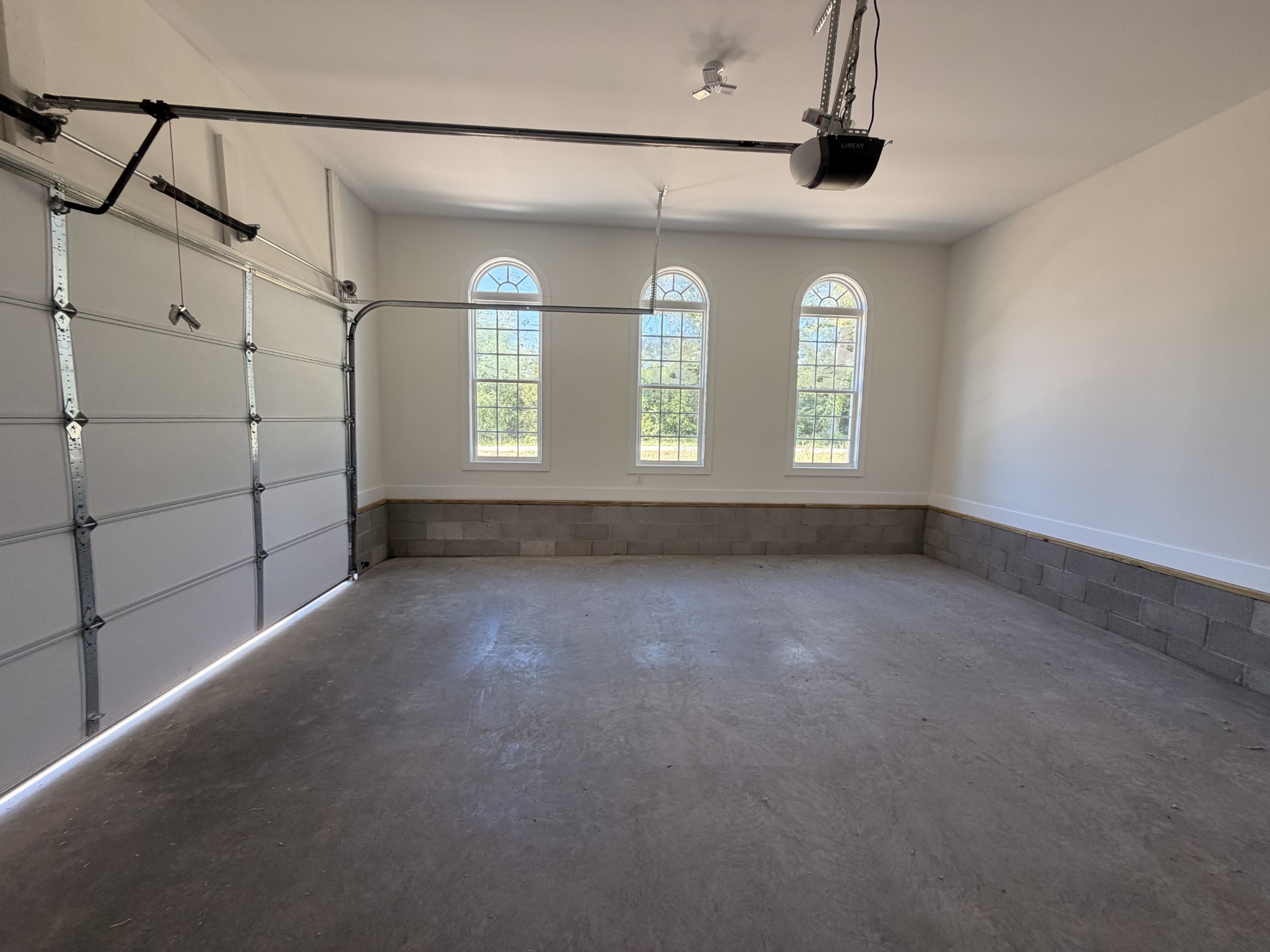 527 Old Hopkinsville Road Cadiz, KY 42211 - Photo 29 of 31 a view of a big room with windows and chandelier fan
