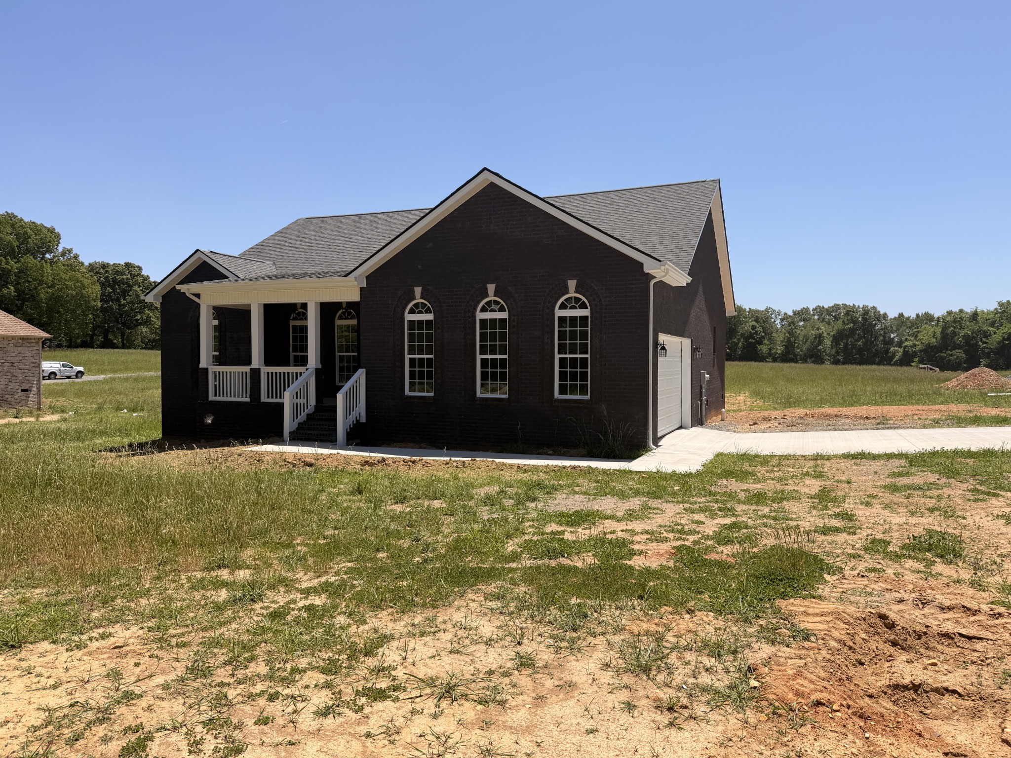 527 Old Hopkinsville Road Cadiz, KY 42211 - Photo 3 of 31 a front view of a house with a yard