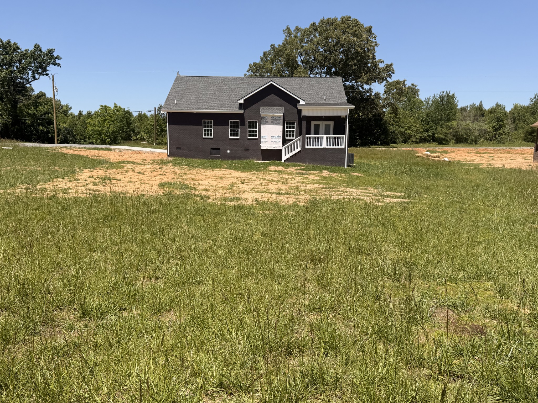 527 Old Hopkinsville Road Cadiz, KY 42211 - Photo 5 of 31 a view of a house with a big yard and large tree