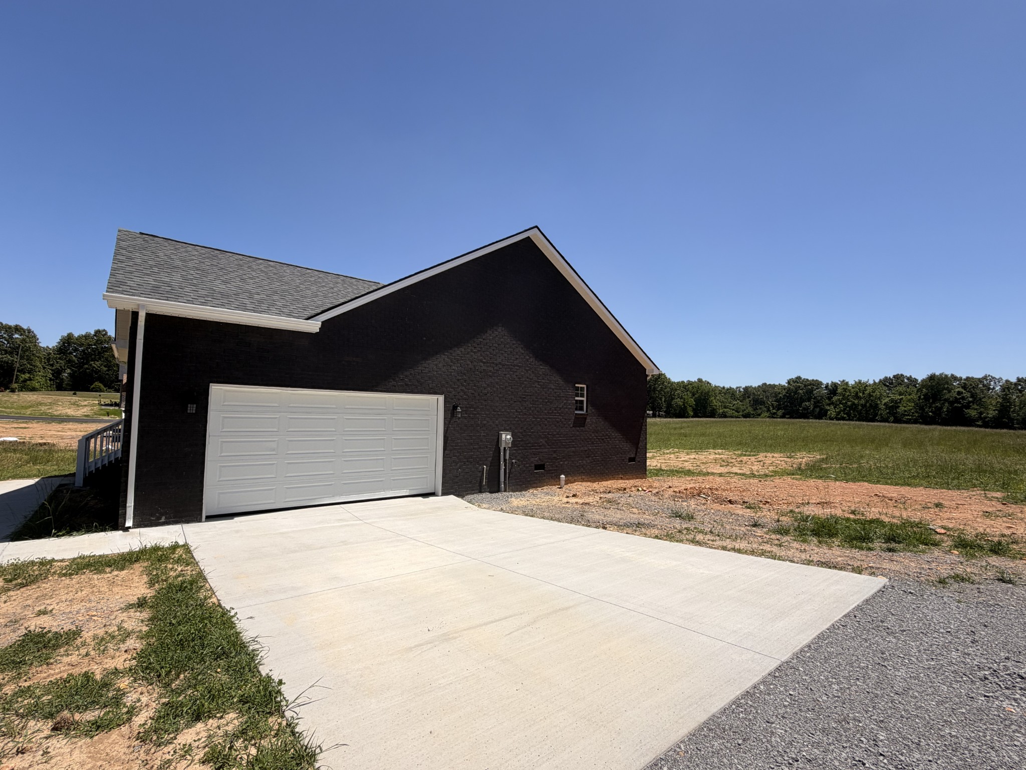 527 Old Hopkinsville Road Cadiz, KY 42211 - Photo 6 of 31 a front view of a house with a yard