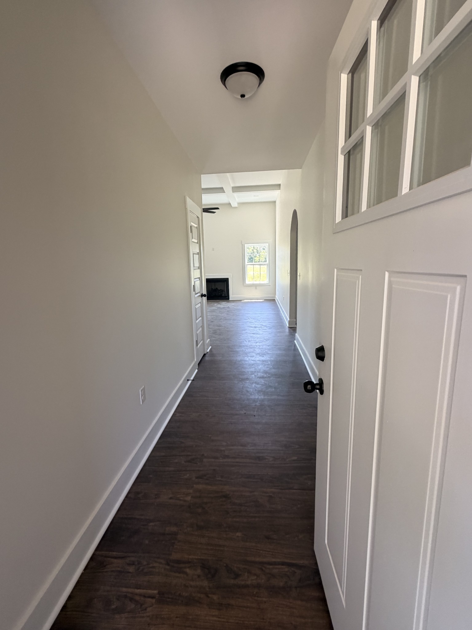 527 Old Hopkinsville Road Cadiz, KY 42211 - Photo 8 of 31 a view of a hallway with wooden floor and staircase