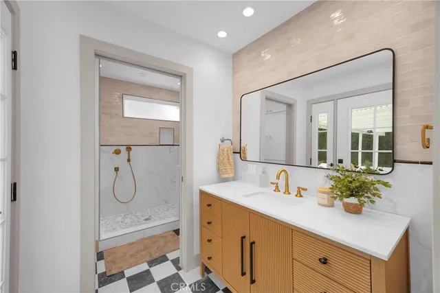 a picture of a bathroom with a window and a shower