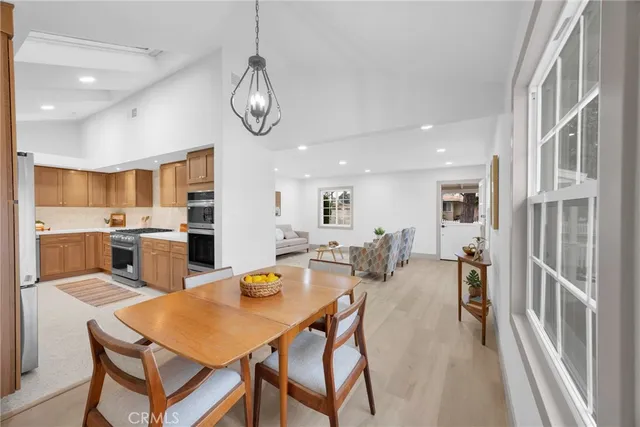 a view of a dining room kitchen and a sink
