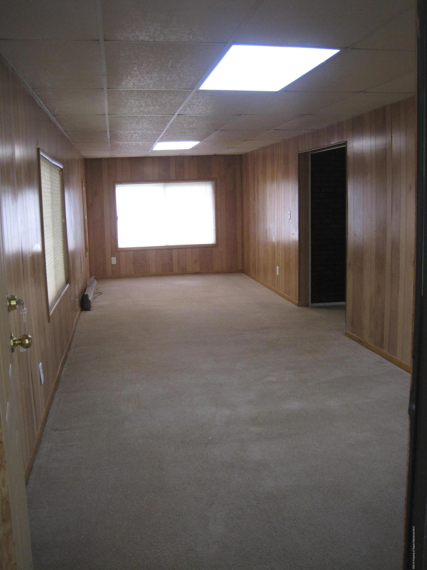 314 Highway 325 Rifle, CO 81650 - Photo 6 of 14 a view of empty room with windows