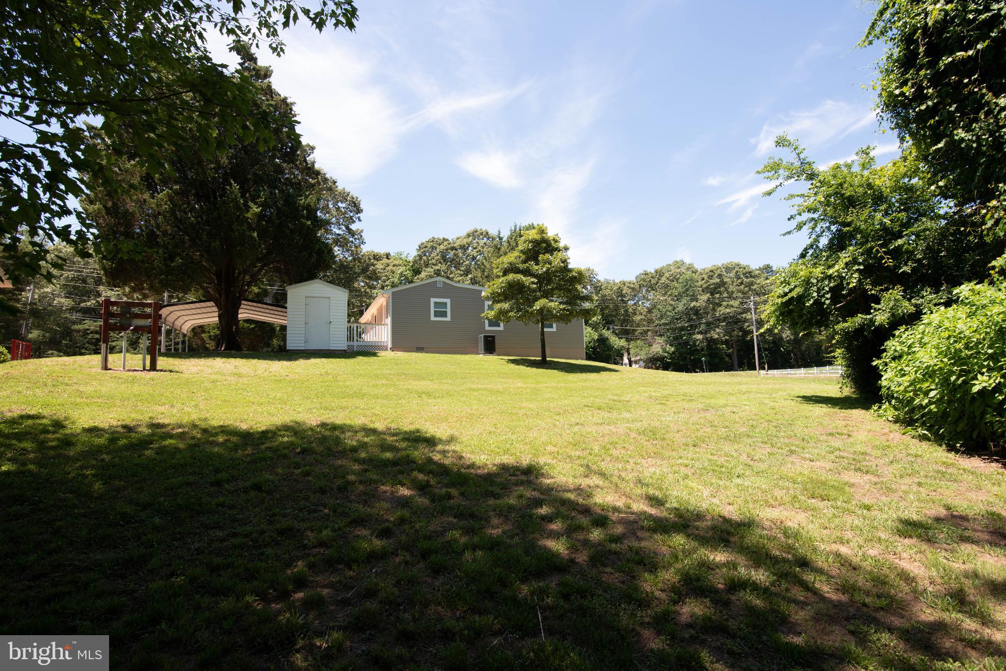 1221 Ball Road Port Republic, MD 20676 - Photo 48 of 72 a view of swimming pool with an outdoor space