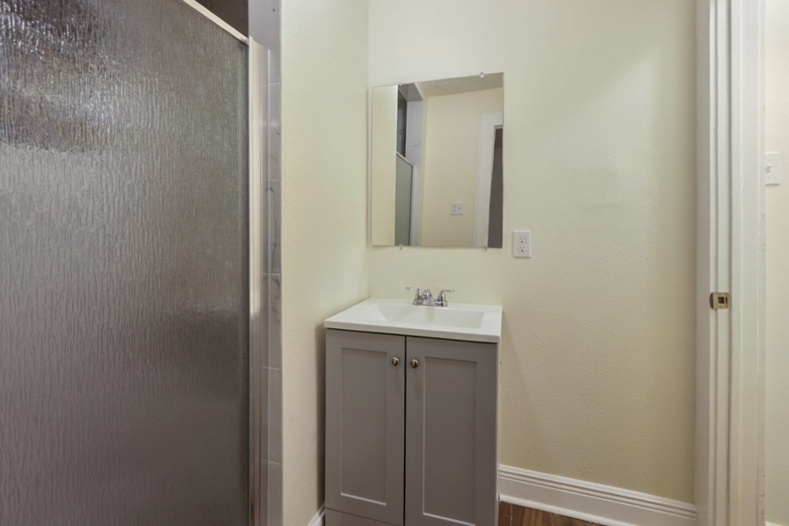4606 Antha Street Houston, TX 77016 - Photo 12 of 27 a bathroom with a sink and mirror