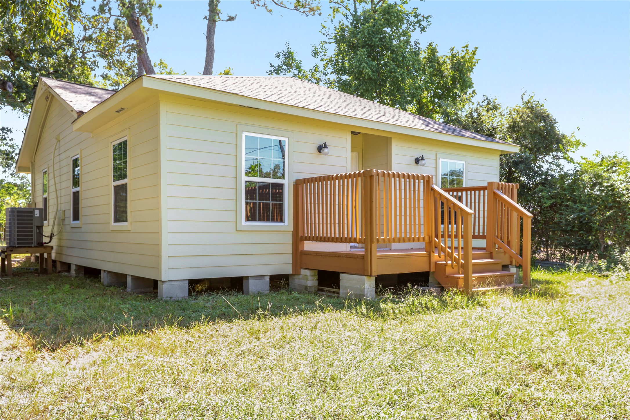 4606 Antha Street Houston, TX 77016 - Photo 18 of 27 a view of a house with a yard