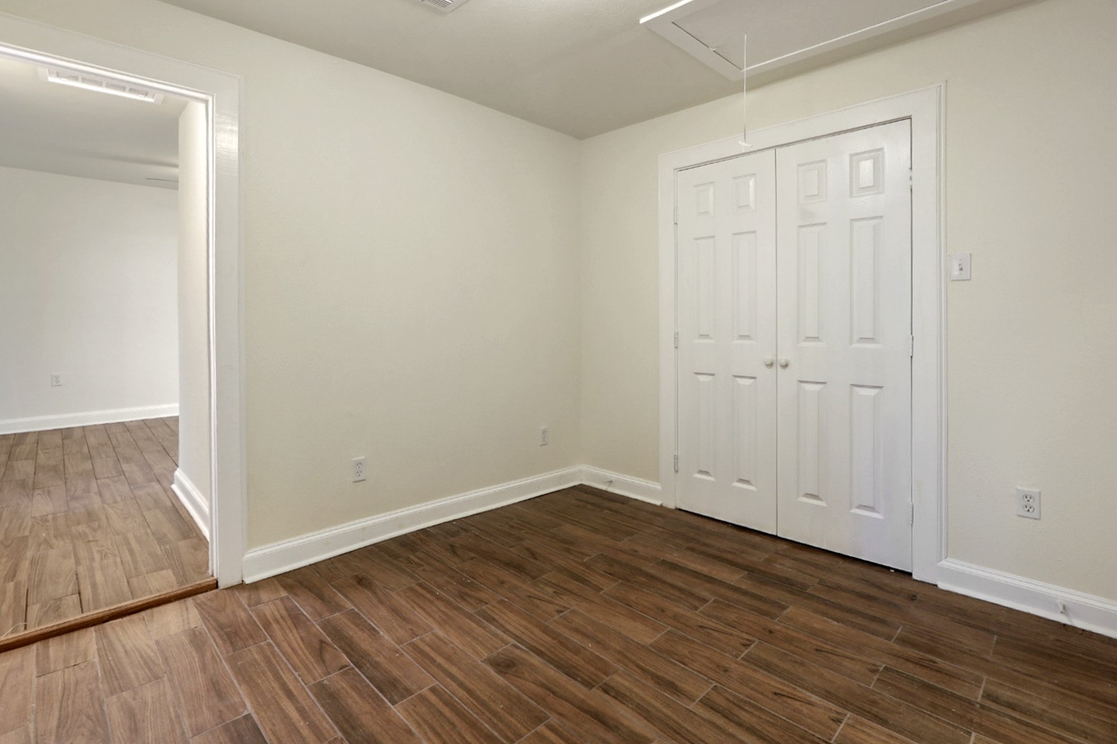 4606 Antha Street Houston, TX 77016 - Photo 19 of 27 a view of an empty room with wooden floor