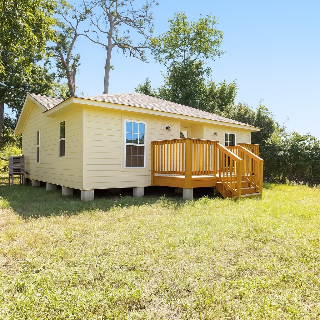 4606 Antha Street Houston, TX 77016 - Photo 2 of 27 a view of a house with a yard