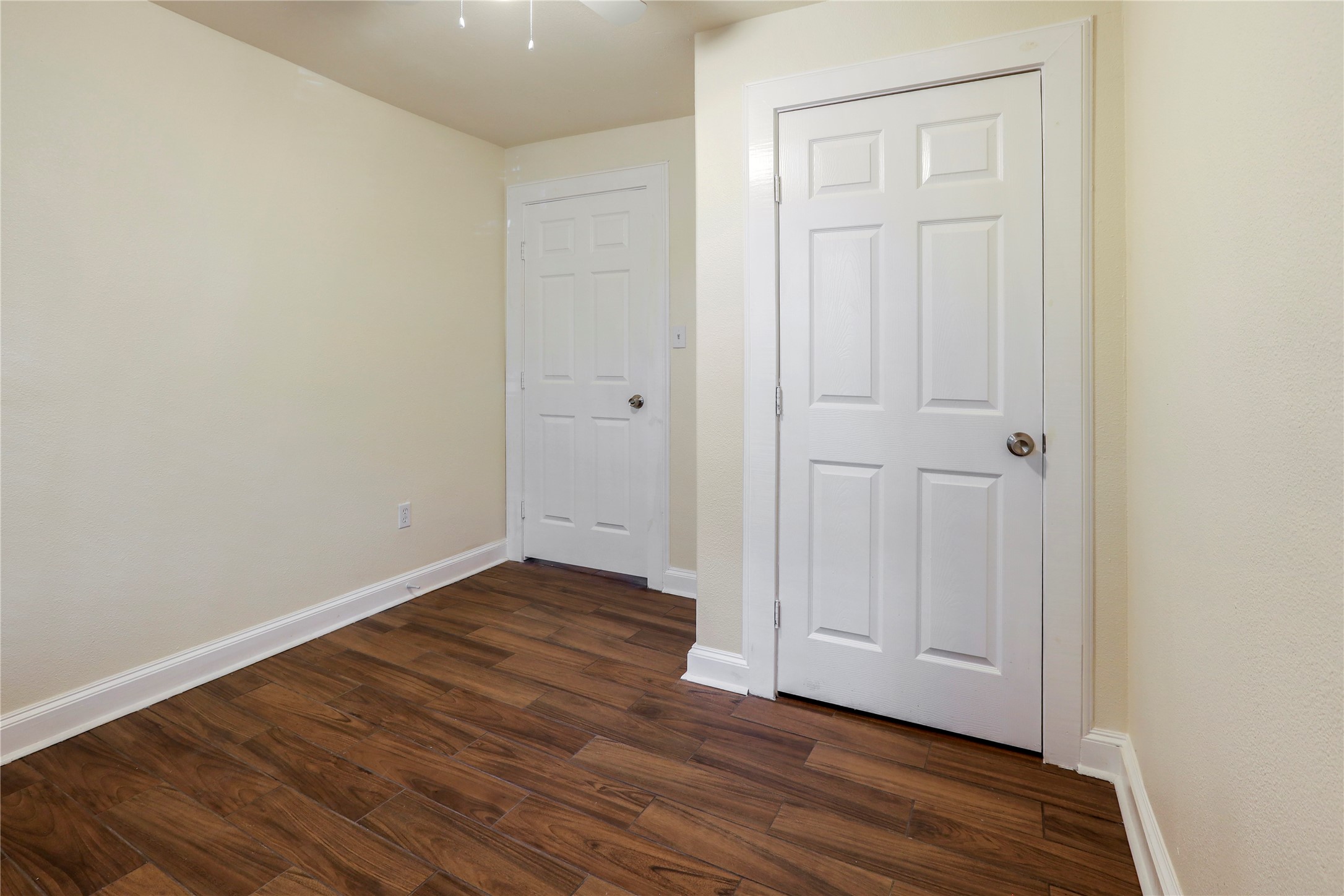 4606 Antha Street Houston, TX 77016 - Photo 24 of 27 a view of an empty room with wooden floor