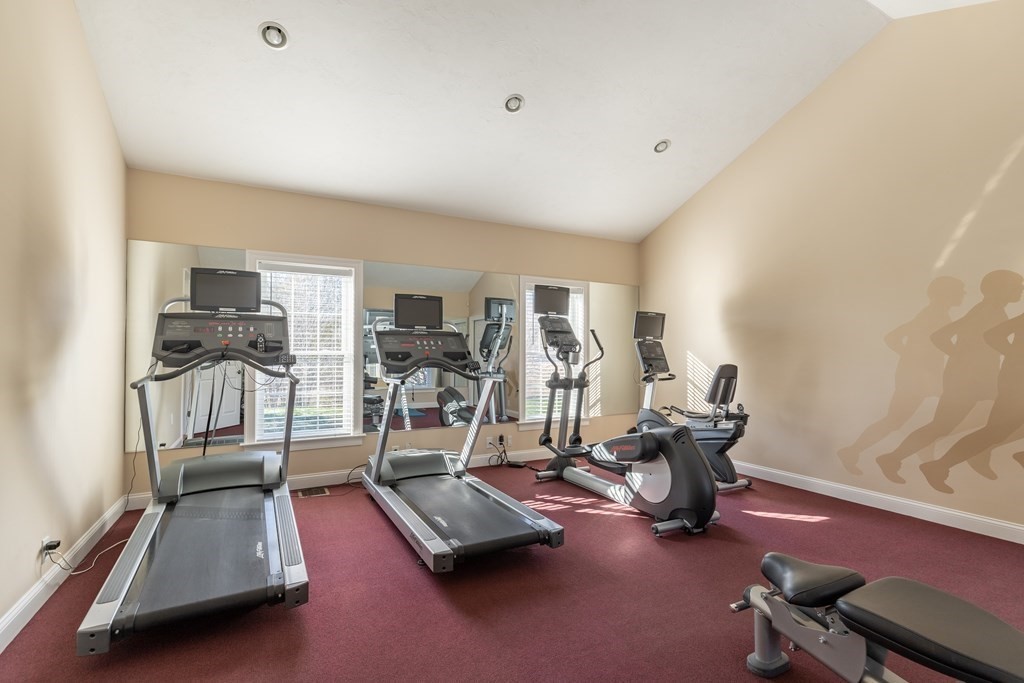 22 English Commons: 12 Boston Street, Unit 22 Topsfield, MA 01983 - Photo 34 of 41 a view of a room with gym equipment