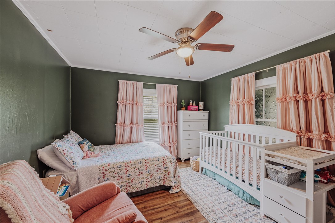 310 North Chestnut Street Seneca, SC 29678 - Photo 16 of 30 A comforting retreat, this bedroom offers a restful atmosphere for peaceful slumber.