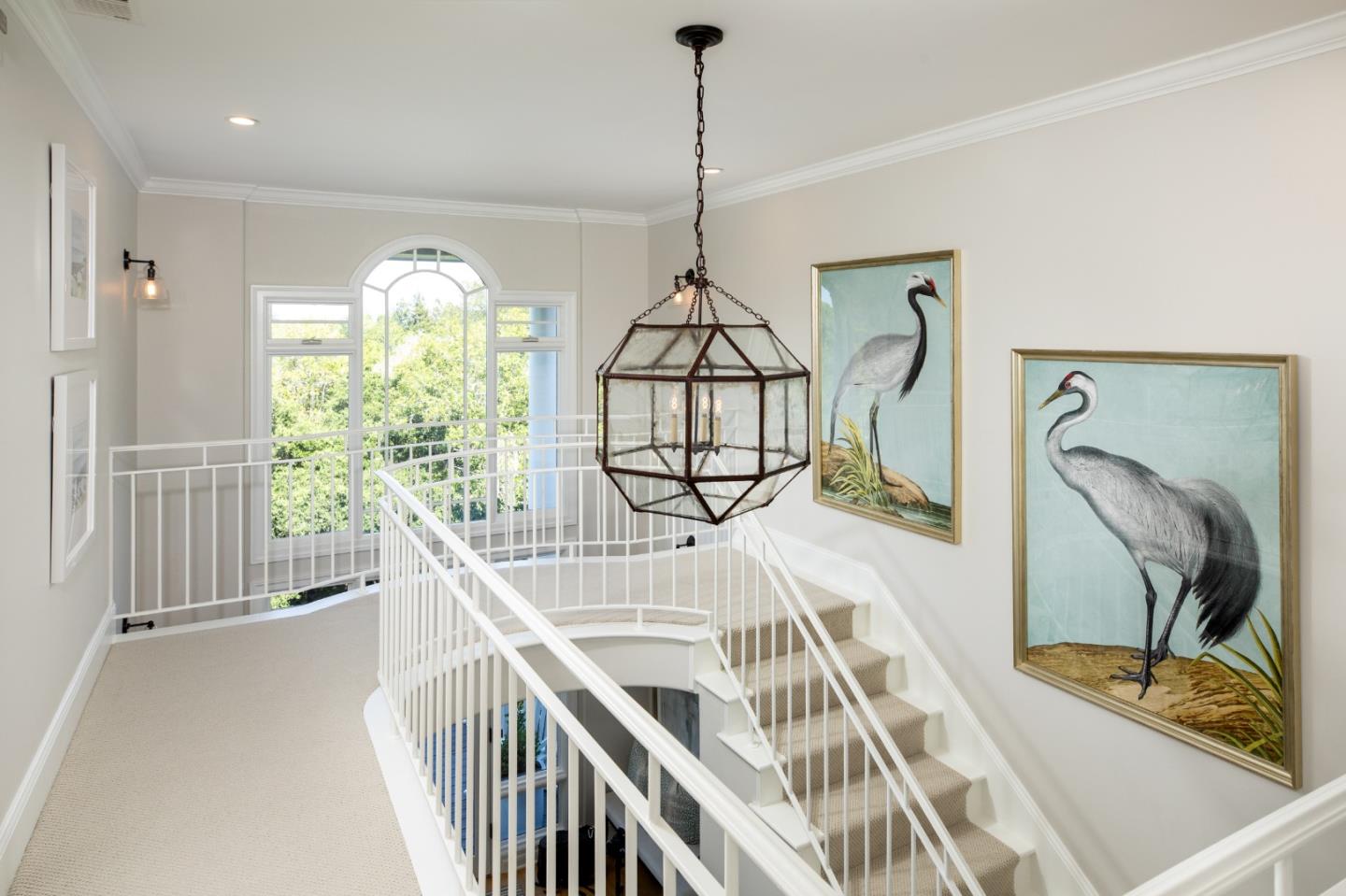 345 Harcross Road Woodside, CA 94062 - Photo 17 of 37 a view of a hallway with furniture and floor to ceiling window