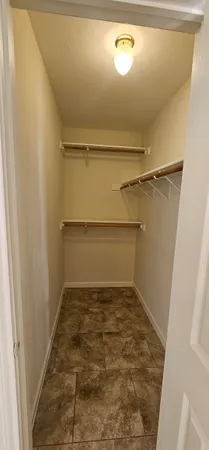 a view of a room with rack on the wall