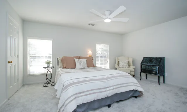 a utility room with cabinets