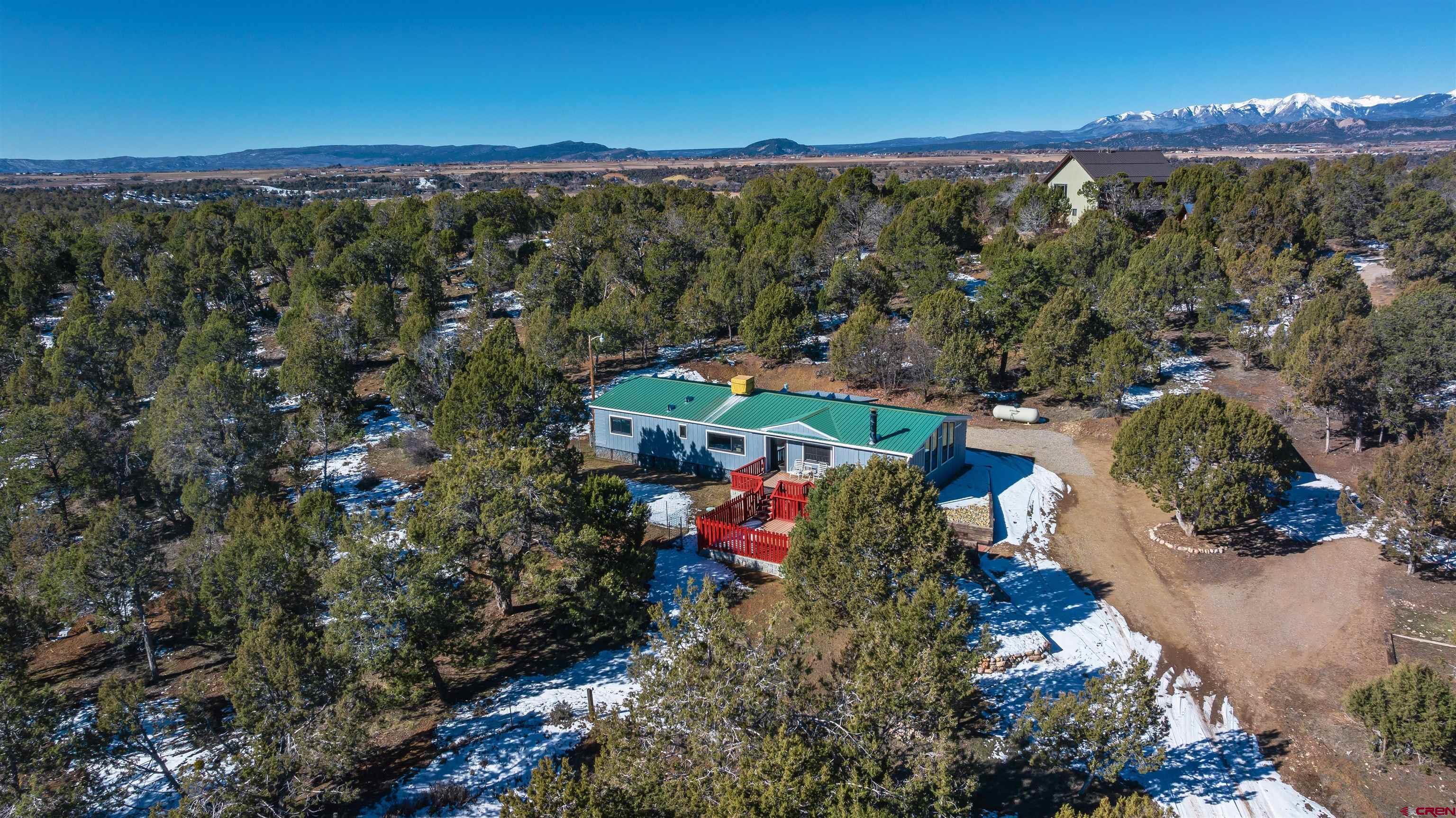 253 Valley Place Durango, CO 81303 - Photo 25 of 26 an aerial view of a building with outdoor space