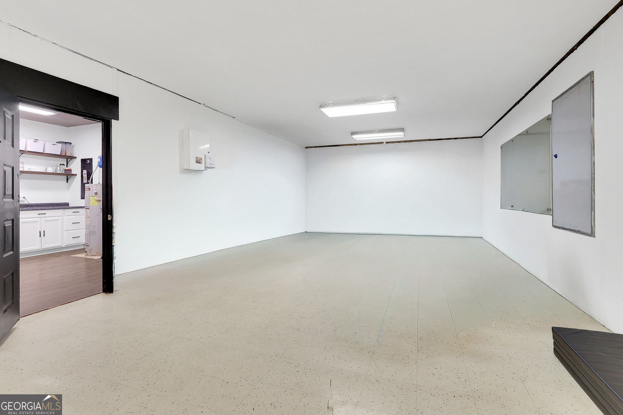 394 Burg Road Locust Grove, GA 30248 - Photo 36 of 40 wooden floor in an empty room