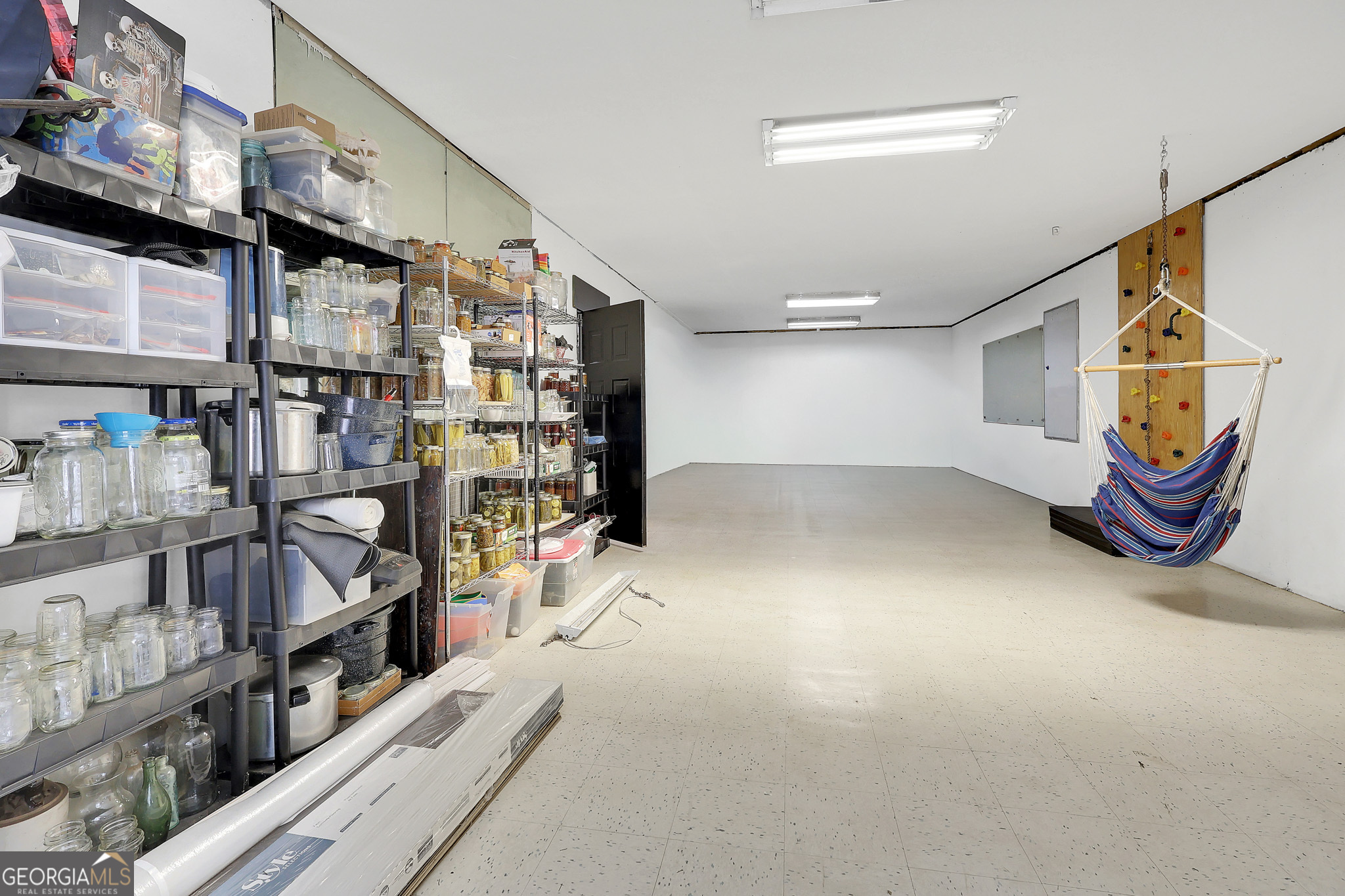 394 Burg Road Locust Grove, GA 30248 - Photo 38 of 40 a view of a storage in a room