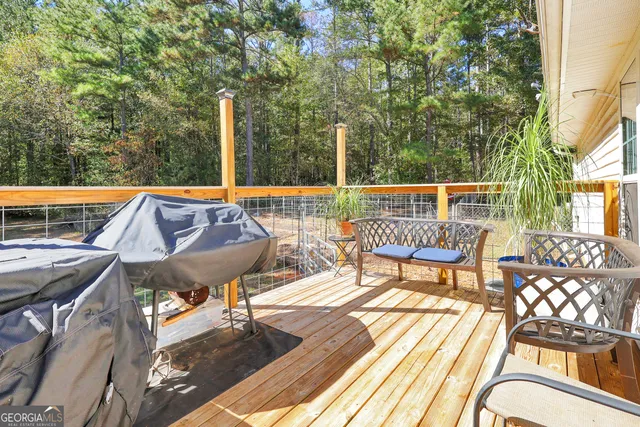 a view of balcony with furniture