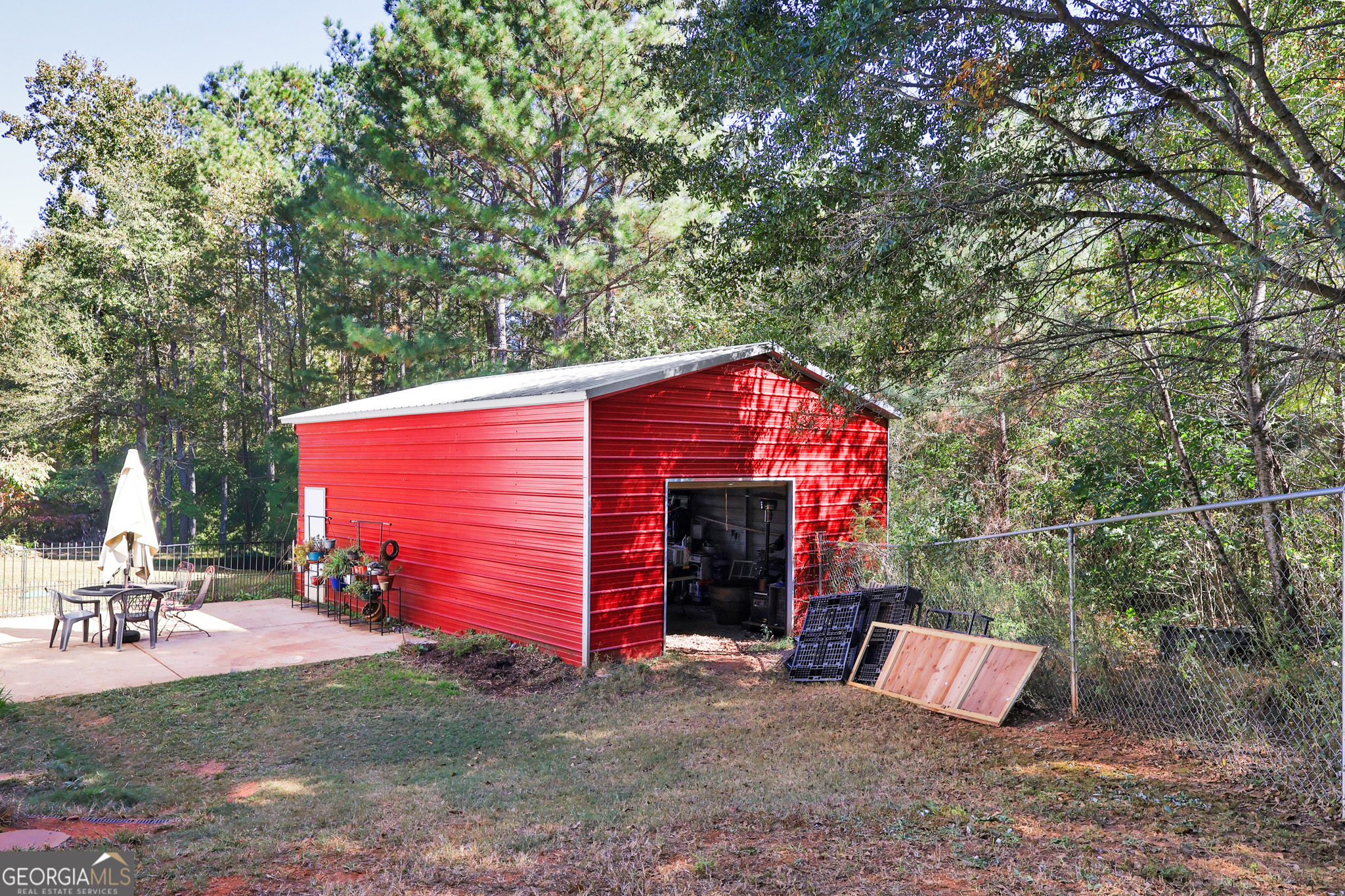 394 Burg Road Locust Grove, GA 30248 - Photo 7 of 40 a view of a house with a yard