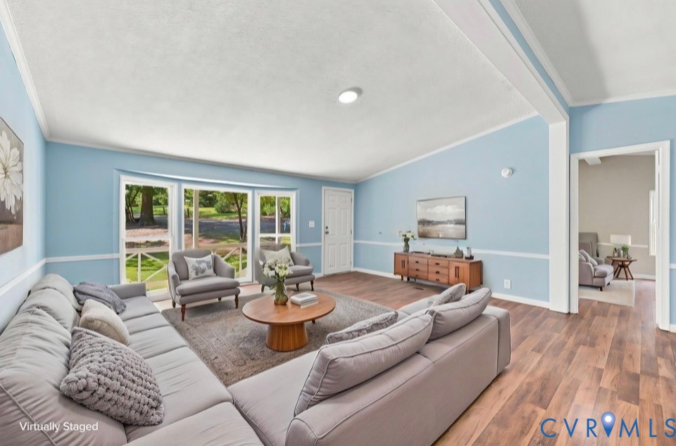 977 Burchs Mill Road Urbanna, VA 23175 - Photo 26 of 38 Bay window, recessed lighting, crown molding, and