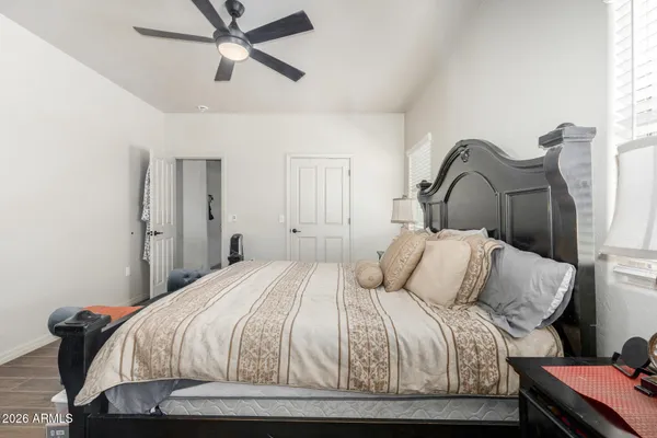 a bathroom with a double vanity sink toilet and a mirror