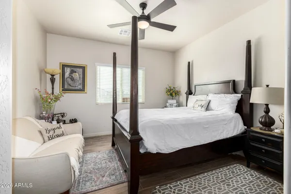 a bed room with a bed and a fish tank