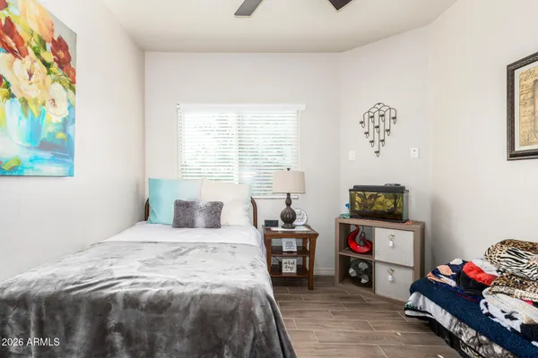 a garage with a storage and utility room