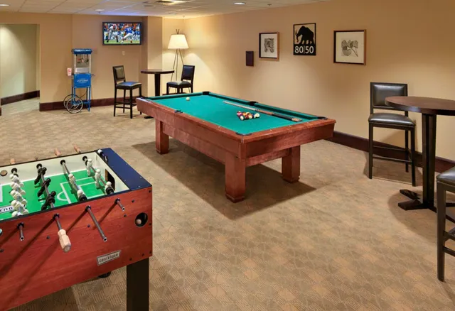 a white building with black door