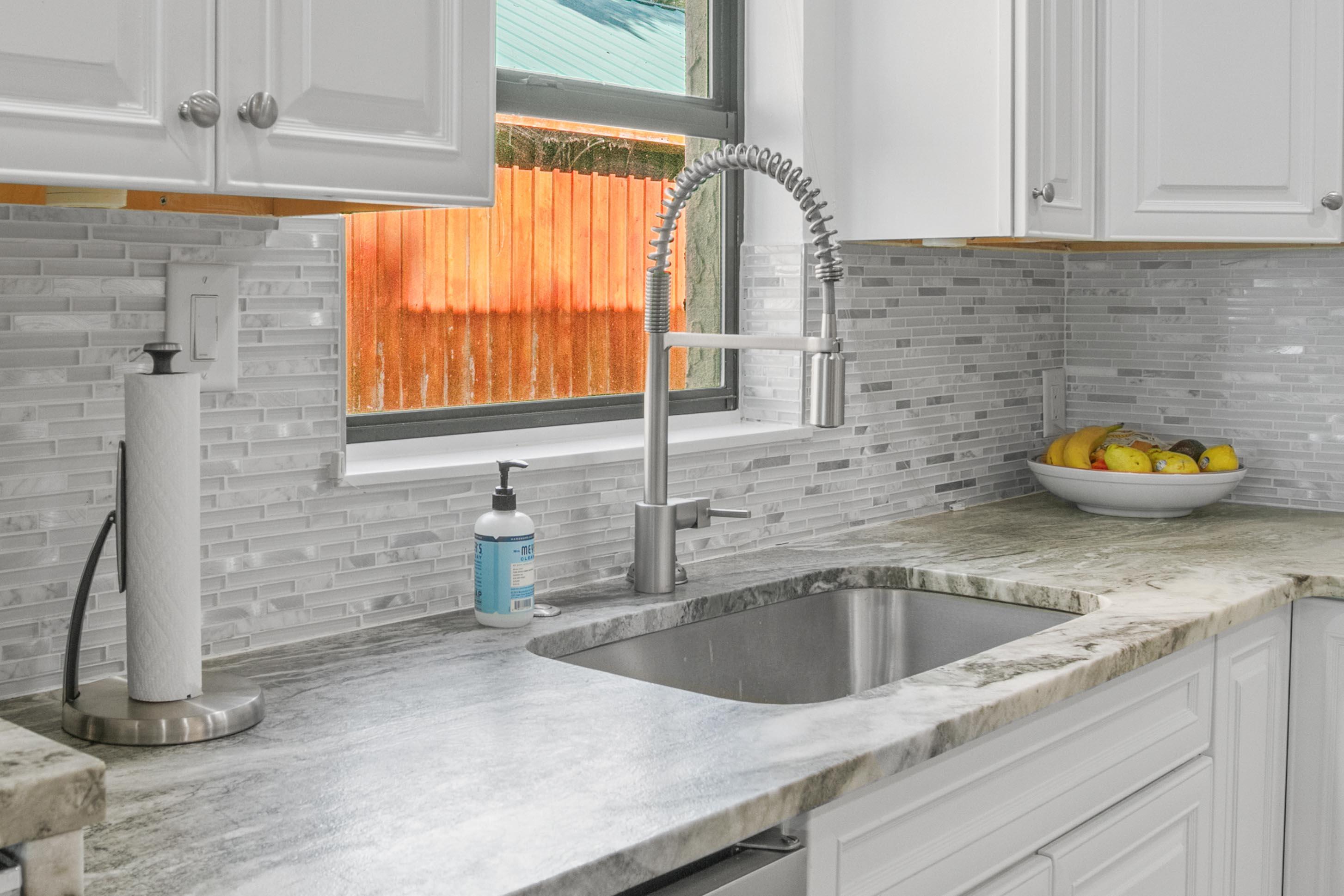 41 Waterview Place Freeport, FL 32439 - Photo 15 of 74 a kitchen with a sink and a window