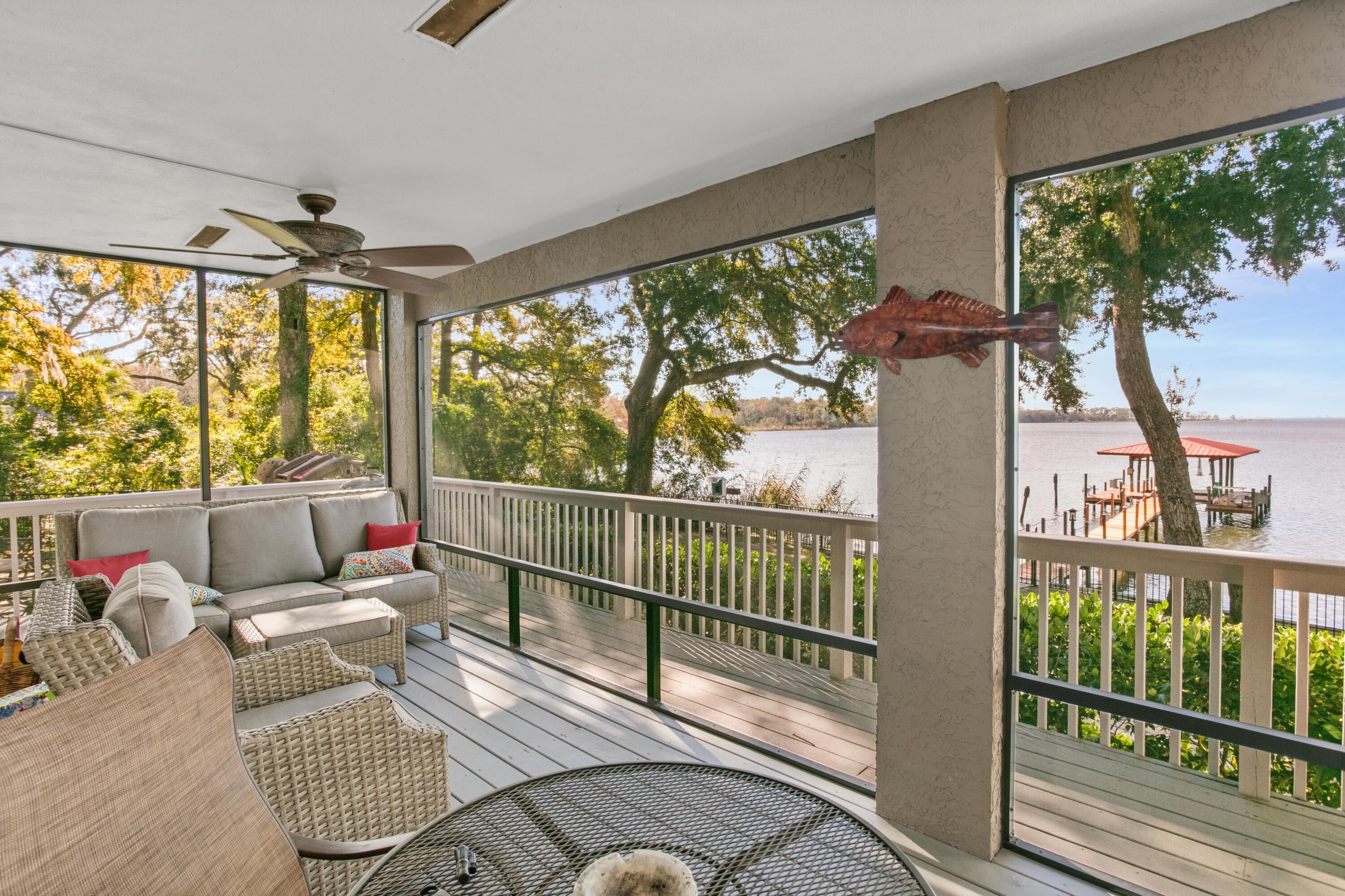 41 Waterview Place Freeport, FL 32439 - Photo 18 of 74 a living room with large windows