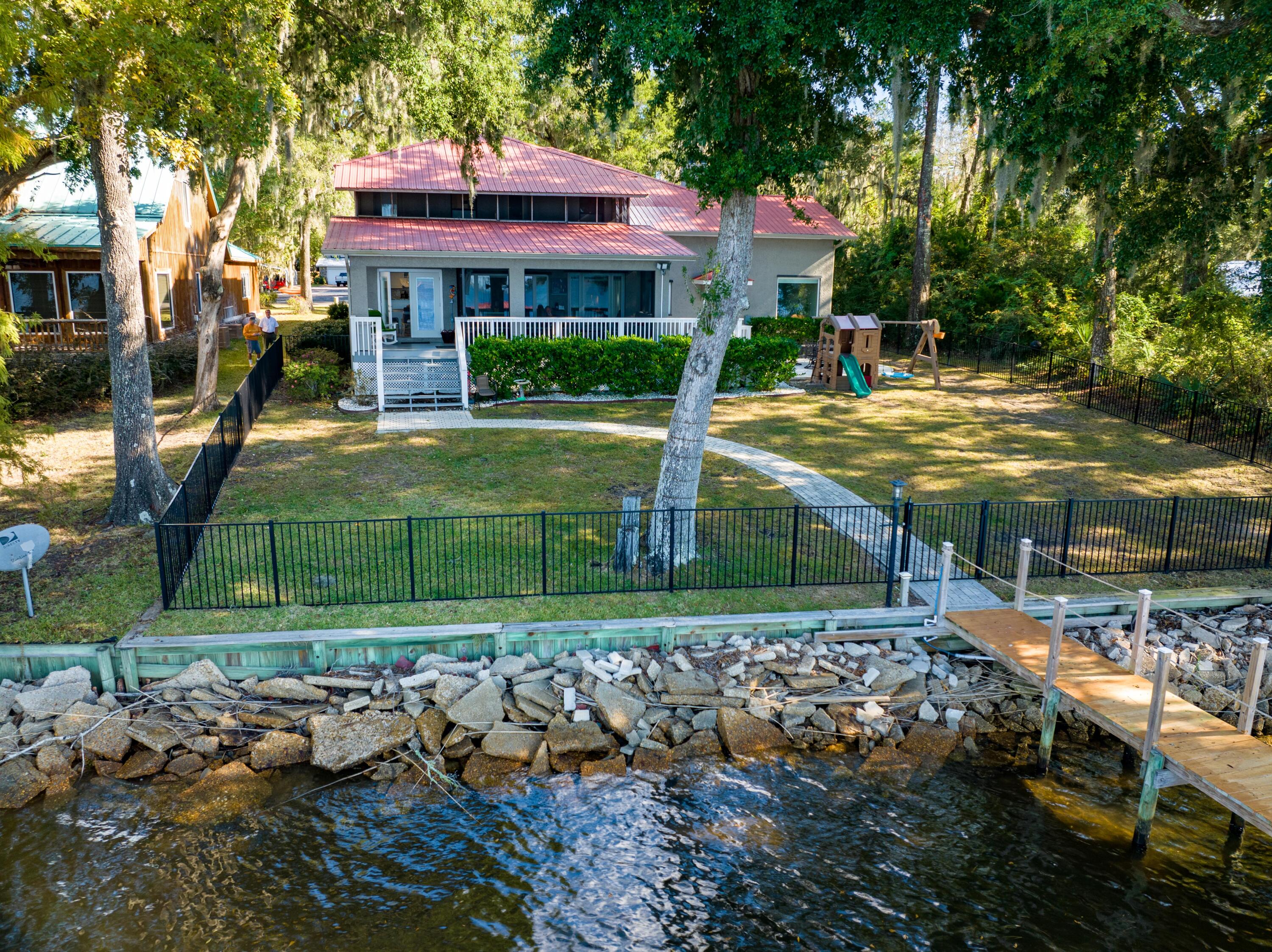 41 Waterview Place Freeport, FL 32439 - Photo 2 of 74 a view of a house with a yard