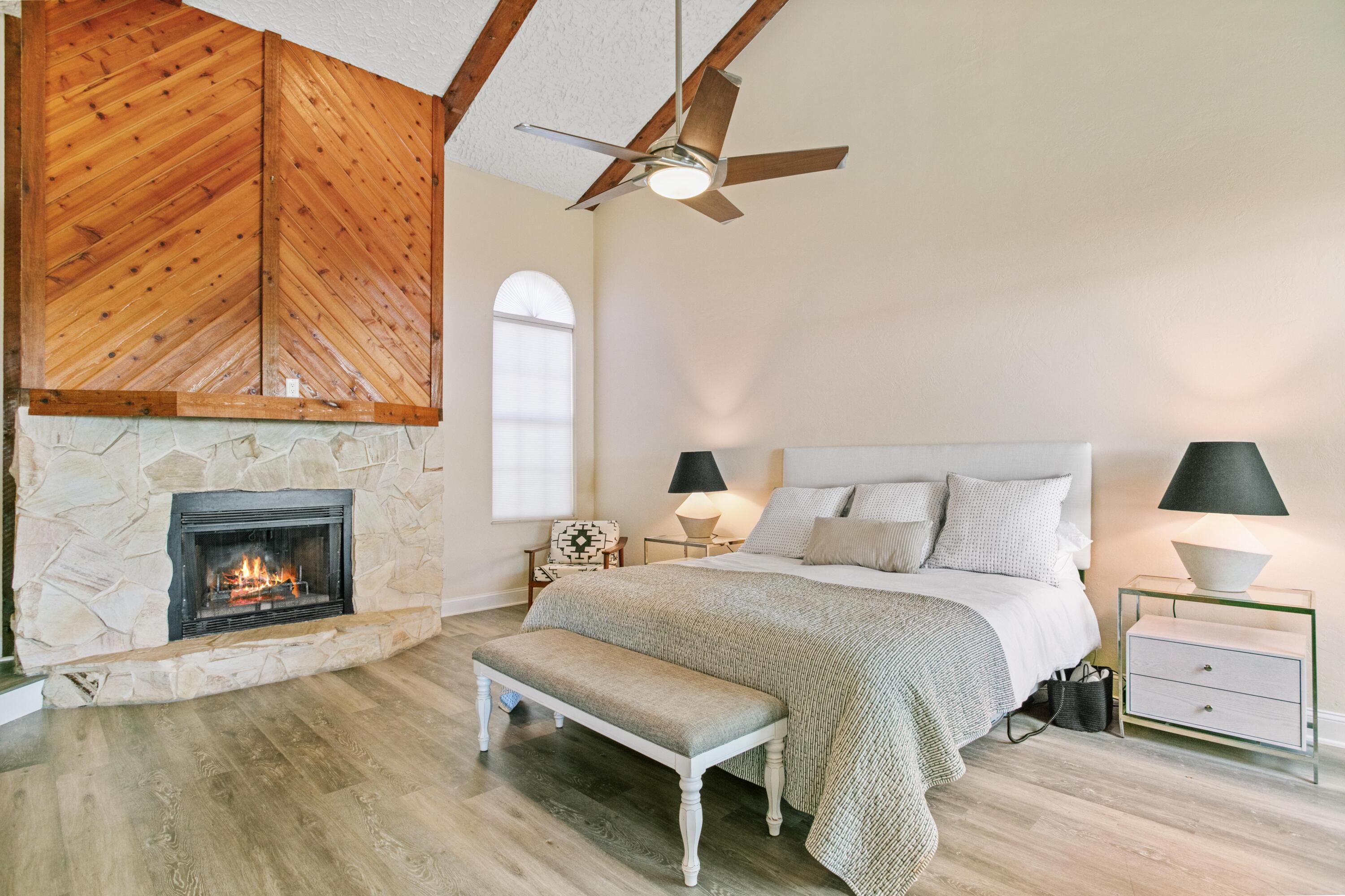 41 Waterview Place Freeport, FL 32439 - Photo 21 of 74 a bedroom with a bed and a fireplace