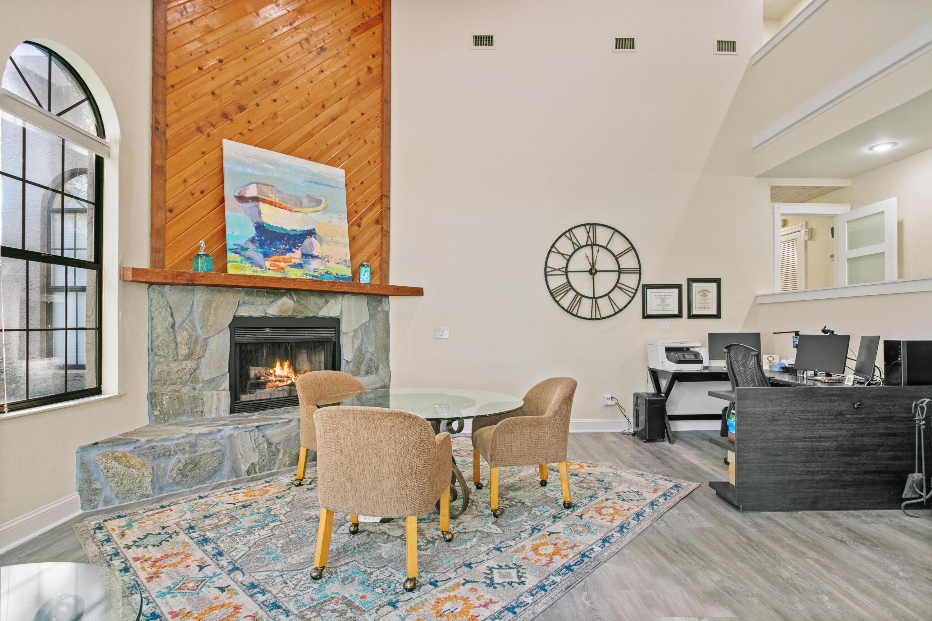 41 Waterview Place Freeport, FL 32439 - Photo 30 of 74 a living room with furniture a rug and a fireplace