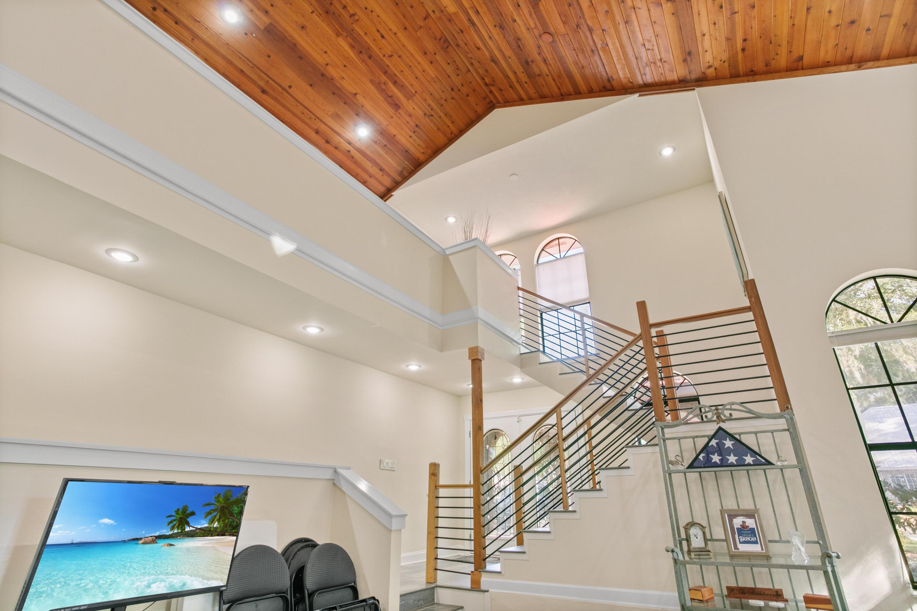41 Waterview Place Freeport, FL 32439 - Photo 33 of 74 a view of entryway and hall with wooden floor