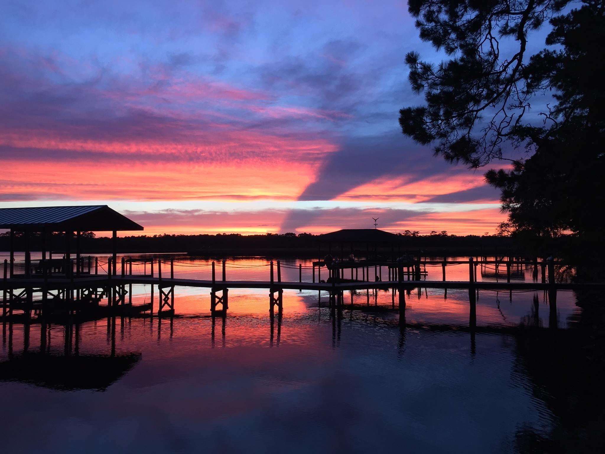 41 Waterview Place Freeport, FL 32439 - Photo 66 of 74 a view of swimming pool outdoor seating and city view