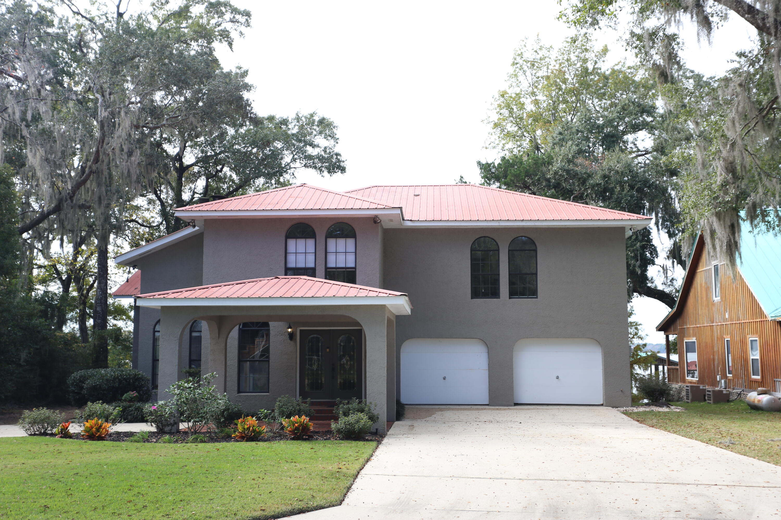 41 Waterview Place Freeport, FL 32439 - Photo 68 of 74 a front view of a house with garden
