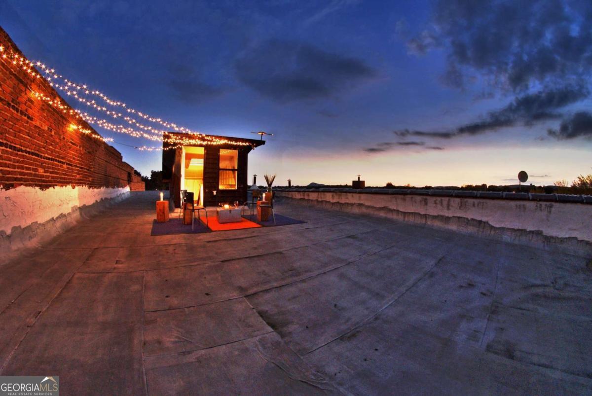 24 Doyle Street Toccoa, GA 30577 - Photo 2 of 7 a view of a swimming pool and an outdoor seating