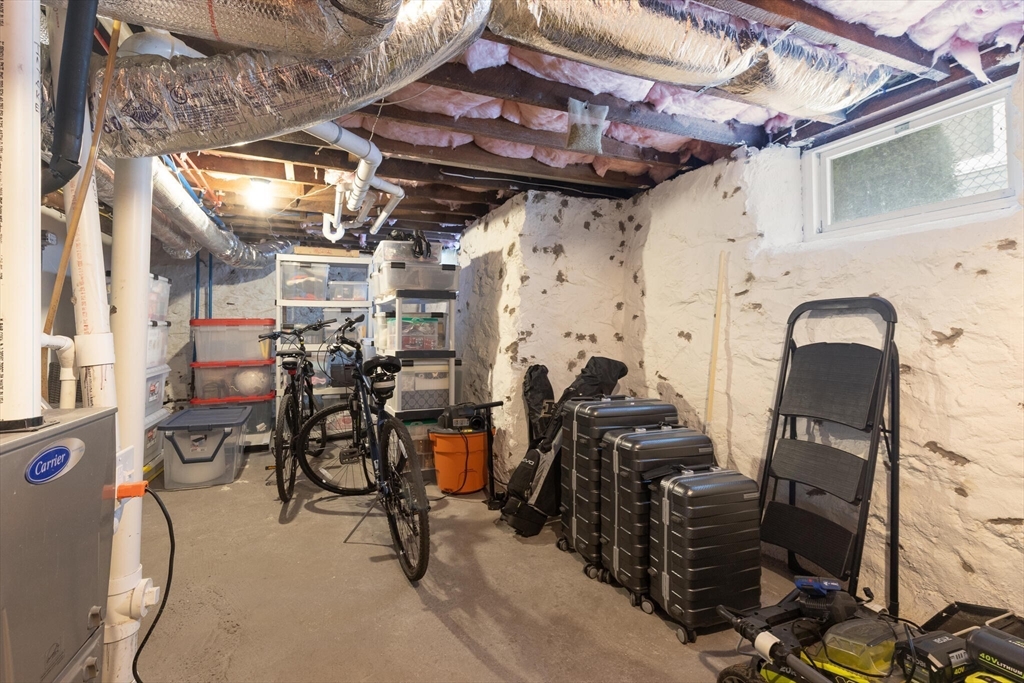 504 Main Street, Unit 1 Watertown, MA 02472 - Photo 29 of 35 a view of a room with gym equipment
