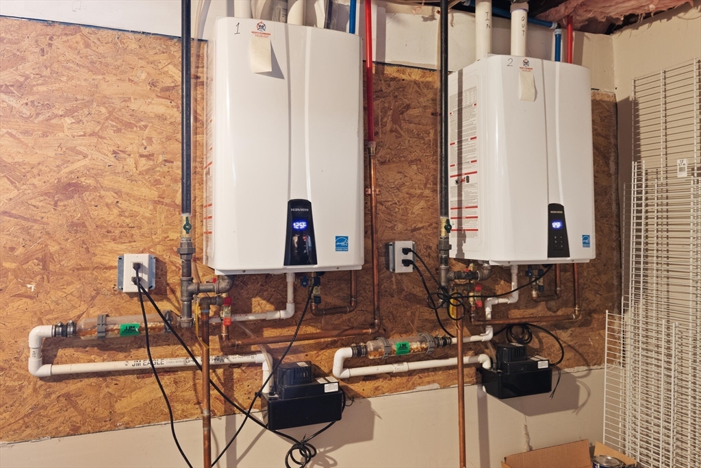 504 Main Street, Unit 1 Watertown, MA 02472 - Photo 30 of 35 a bathroom with a sink and a mirror